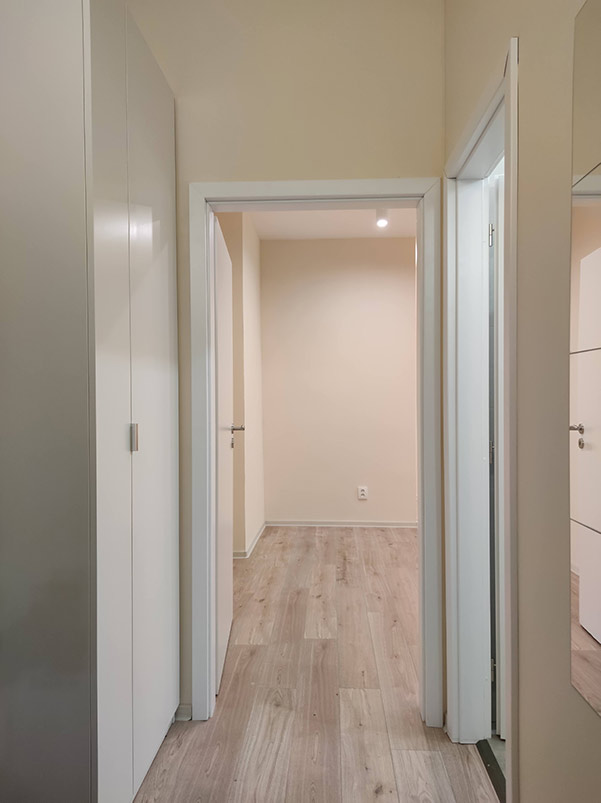 corridor with built-in wardrobe after reconstruction